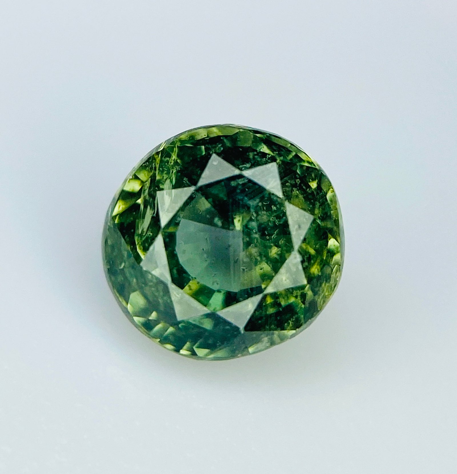 IMG_4905 IGI Certified 1.25 Cts Natural Green Sapphire Gemstone - Image 1
