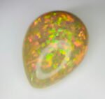 AIGS Certified 33.09 Cts Natural yellow Opal Cabochon