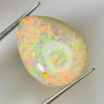 AIGS Certified 33.09 Cts Natural yellow Opal Cabochon - Image 6