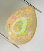 AIGS Certified 33.09 Cts Natural yellow Opal Cabochon - Image 8